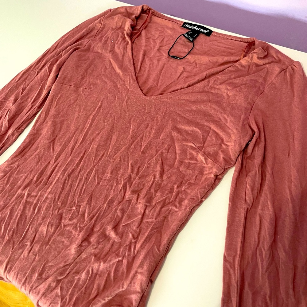Barely worn Charlotte Russe pink silky bodysuit, stretchy with bodysuit bottom